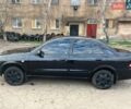 Чорний Ніссан Альмера, об'ємом двигуна 1.6 л та пробігом 140 тис. км за 5900 $, фото 3 на Automoto.ua