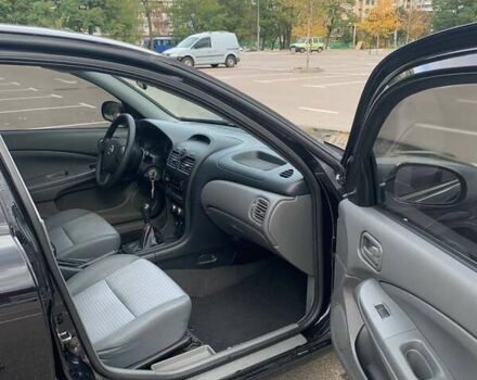 Черный Ниссан Альмера, объемом двигателя 1.6 л и пробегом 129 тыс. км за 6500 $, фото 11 на Automoto.ua