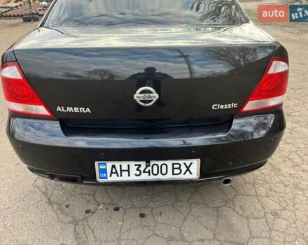 Чорний Ніссан Альмера, об'ємом двигуна 1.6 л та пробігом 140 тис. км за 5900 $, фото 12 на Automoto.ua