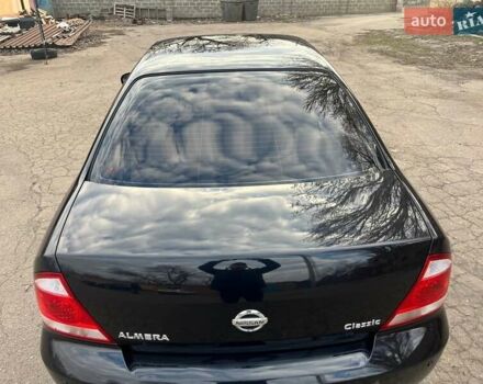 Чорний Ніссан Альмера, об'ємом двигуна 1.6 л та пробігом 140 тис. км за 5900 $, фото 5 на Automoto.ua