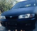 Чорний Ніссан Альмера, об'ємом двигуна 1.6 л та пробігом 111 тис. км за 1895 $, фото 1 на Automoto.ua