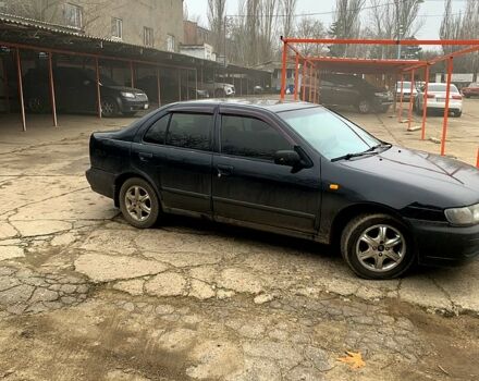 Черный Ниссан Альмера, объемом двигателя 1.4 л и пробегом 0 тыс. км за 1700 $, фото 1 на Automoto.ua