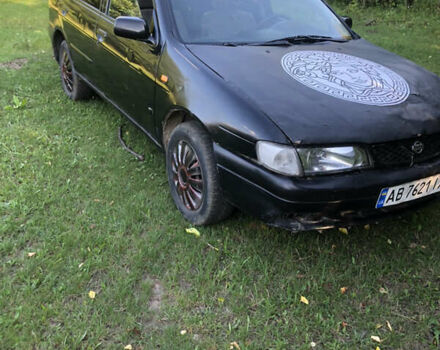 Чорний Ніссан Альмера, об'ємом двигуна 1.39 л та пробігом 100 тис. км за 965 $, фото 1 на Automoto.ua