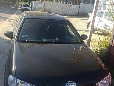Черный Ниссан Альмера, объемом двигателя 2.2 л и пробегом 350 тыс. км за 2700 $, фото 1 на Automoto.ua
