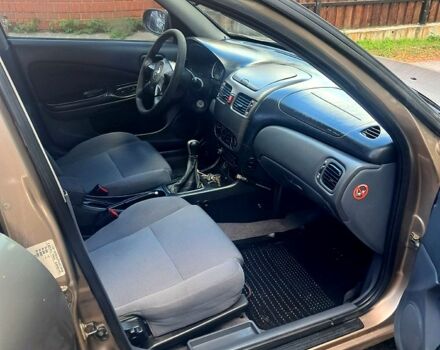 Коричневый Ниссан Альмера, объемом двигателя 1.5 л и пробегом 315 тыс. км за 3000 $, фото 9 на Automoto.ua