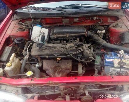 Красный Ниссан Альмера, объемом двигателя 1.39 л и пробегом 332 тыс. км за 1300 $, фото 6 на Automoto.ua