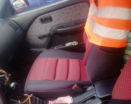 Красный Ниссан Альмера, объемом двигателя 1.39 л и пробегом 332 тыс. км за 1300 $, фото 15 на Automoto.ua