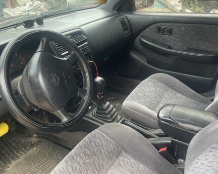 Красный Ниссан Альмера, объемом двигателя 1.6 л и пробегом 30 тыс. км за 1550 $, фото 2 на Automoto.ua