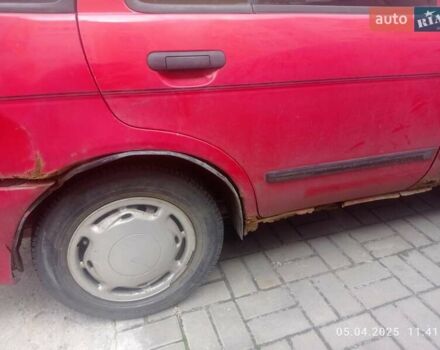 Красный Ниссан Альмера, объемом двигателя 1.39 л и пробегом 332 тыс. км за 1300 $, фото 8 на Automoto.ua