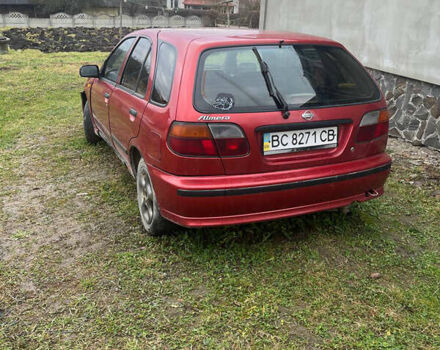 Красный Ниссан Альмера, объемом двигателя 1.4 л и пробегом 250 тыс. км за 860 $, фото 4 на Automoto.ua