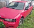 Красный Ниссан Альмера, объемом двигателя 1.4 л и пробегом 300 тыс. км за 1000 $, фото 1 на Automoto.ua
