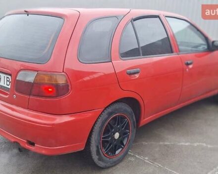 Красный Ниссан Альмера, объемом двигателя 1.39 л и пробегом 29 тыс. км за 2250 $, фото 3 на Automoto.ua