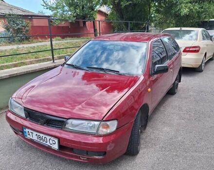 Красный Ниссан Альмера, объемом двигателя 1.39 л и пробегом 225 тыс. км за 2250 $, фото 2 на Automoto.ua