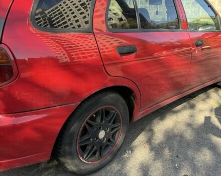 Червоний Ніссан Альмера, об'ємом двигуна 1.4 л та пробігом 293 тис. км за 1200 $, фото 3 на Automoto.ua