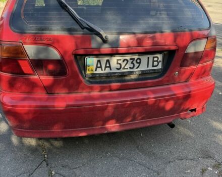 Червоний Ніссан Альмера, об'ємом двигуна 1.4 л та пробігом 293 тис. км за 1200 $, фото 5 на Automoto.ua