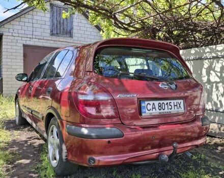 Красный Ниссан Альмера, объемом двигателя 1.5 л и пробегом 293 тыс. км за 2200 $, фото 4 на Automoto.ua
