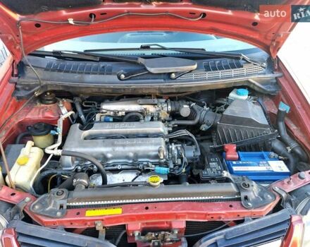 Красный Ниссан Альмера, объемом двигателя 2 л и пробегом 170 тыс. км за 3500 $, фото 14 на Automoto.ua