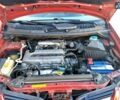 Красный Ниссан Альмера, объемом двигателя 2 л и пробегом 170 тыс. км за 3500 $, фото 14 на Automoto.ua