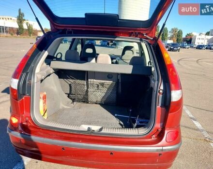 Красный Ниссан Альмера, объемом двигателя 2 л и пробегом 170 тыс. км за 3500 $, фото 13 на Automoto.ua