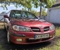 Красный Ниссан Альмера, объемом двигателя 1.5 л и пробегом 293 тыс. км за 2200 $, фото 7 на Automoto.ua