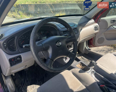 Красный Ниссан Альмера, объемом двигателя 1.77 л и пробегом 246 тыс. км за 2800 $, фото 11 на Automoto.ua