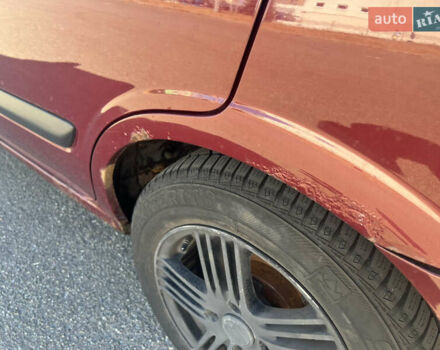 Красный Ниссан Альмера, объемом двигателя 1.77 л и пробегом 246 тыс. км за 2800 $, фото 5 на Automoto.ua
