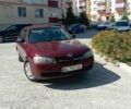 Красный Ниссан Альмера, объемом двигателя 1.5 л и пробегом 210 тыс. км за 3400 $, фото 1 на Automoto.ua