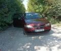 Красный Ниссан Альмера, объемом двигателя 1.5 л и пробегом 210 тыс. км за 3400 $, фото 2 на Automoto.ua