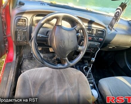 Червоний Ніссан Альмера, об'ємом двигуна 2 л та пробігом 0 тис. км за 350 $, фото 6 на Automoto.ua