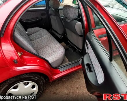 Красный Ниссан Альмера, объемом двигателя 1.4 л и пробегом 174 тыс. км за 2300 $, фото 9 на Automoto.ua