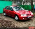 Красный Ниссан Альмера, объемом двигателя 1.4 л и пробегом 174 тыс. км за 2300 $, фото 1 на Automoto.ua