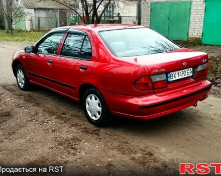 Красный Ниссан Альмера, объемом двигателя 1.4 л и пробегом 174 тыс. км за 2300 $, фото 3 на Automoto.ua