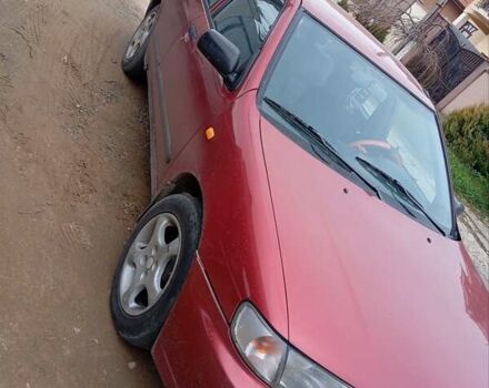 Красный Ниссан Альмера, объемом двигателя 1.4 л и пробегом 300 тыс. км за 1100 $, фото 15 на Automoto.ua