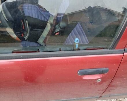 Красный Ниссан Альмера, объемом двигателя 1.4 л и пробегом 300 тыс. км за 1100 $, фото 11 на Automoto.ua