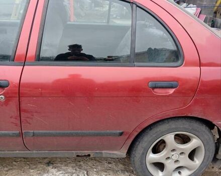 Красный Ниссан Альмера, объемом двигателя 1.4 л и пробегом 300 тыс. км за 1100 $, фото 10 на Automoto.ua