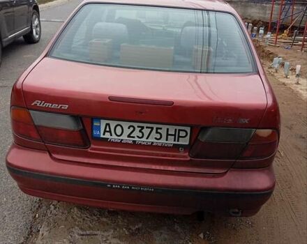 Красный Ниссан Альмера, объемом двигателя 1.4 л и пробегом 300 тыс. км за 1100 $, фото 7 на Automoto.ua