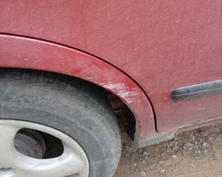 Красный Ниссан Альмера, объемом двигателя 1.4 л и пробегом 300 тыс. км за 1100 $, фото 4 на Automoto.ua