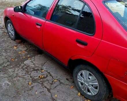 Червоний Ніссан Альмера, об'ємом двигуна 1.4 л та пробігом 0 тис. км за 1200 $, фото 1 на Automoto.ua