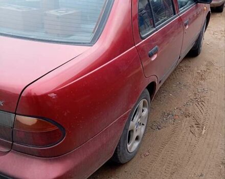 Красный Ниссан Альмера, объемом двигателя 1.4 л и пробегом 300 тыс. км за 1100 $, фото 6 на Automoto.ua