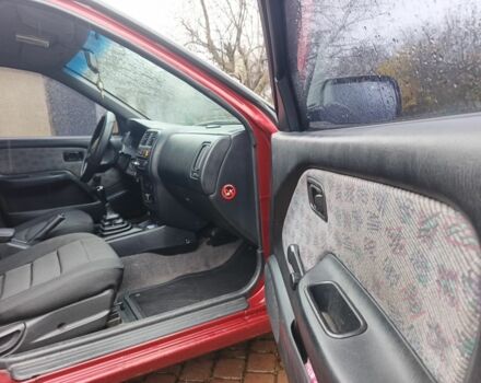 Червоний Ніссан Альмера, об'ємом двигуна 1.4 л та пробігом 3 тис. км за 1900 $, фото 3 на Automoto.ua