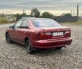 Красный Ниссан Альмера, объемом двигателя 1.4 л и пробегом 310 тыс. км за 1499 $, фото 1 на Automoto.ua
