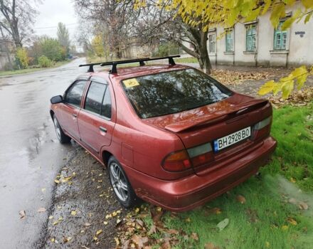 Червоний Ніссан Альмера, об'ємом двигуна 1.4 л та пробігом 3 тис. км за 1900 $, фото 5 на Automoto.ua