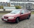 Красный Ниссан Альмера, объемом двигателя 1.4 л и пробегом 310 тыс. км за 1499 $, фото 1 на Automoto.ua