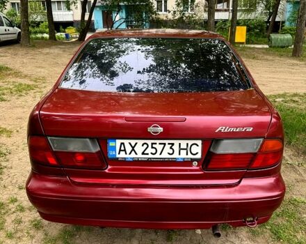 Красный Ниссан Альмера, объемом двигателя 1.4 л и пробегом 308 тыс. км за 2000 $, фото 4 на Automoto.ua