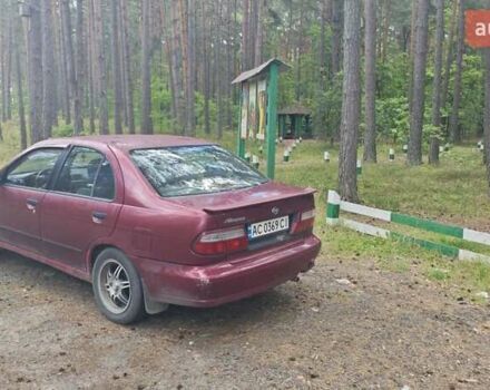 Червоний Ніссан Альмера, об'ємом двигуна 1.4 л та пробігом 416 тис. км за 799 $, фото 9 на Automoto.ua