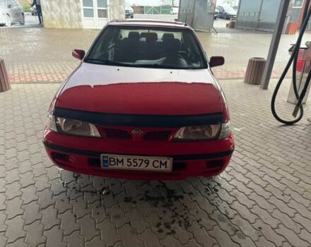 Червоний Ніссан Альмера, об'ємом двигуна 1.4 л та пробігом 250 тис. км за 1500 $, фото 4 на Automoto.ua