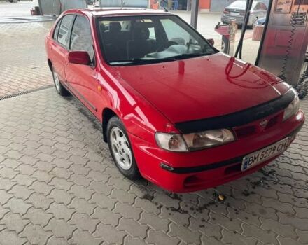 Червоний Ніссан Альмера, об'ємом двигуна 1.4 л та пробігом 250 тис. км за 1500 $, фото 5 на Automoto.ua