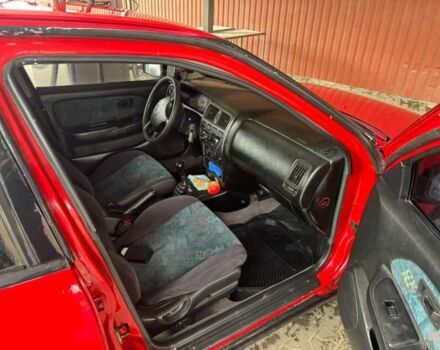 Червоний Ніссан Альмера, об'ємом двигуна 1.4 л та пробігом 250 тис. км за 1500 $, фото 6 на Automoto.ua
