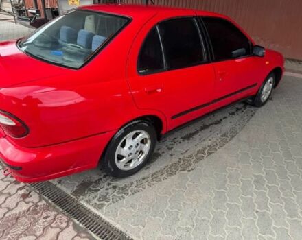 Червоний Ніссан Альмера, об'ємом двигуна 1.4 л та пробігом 250 тис. км за 1500 $, фото 7 на Automoto.ua