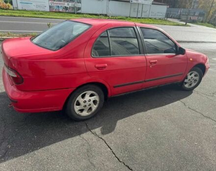 Червоний Ніссан Альмера, об'ємом двигуна 1.4 л та пробігом 250 тис. км за 1500 $, фото 2 на Automoto.ua